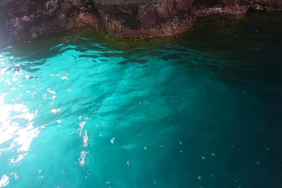 From Praia: Boat Trip, Snorkeling, Cave & BBQ on the Beach - Black-Sand Beach BBQ Lunch: Tasty Food, Rocky Ground