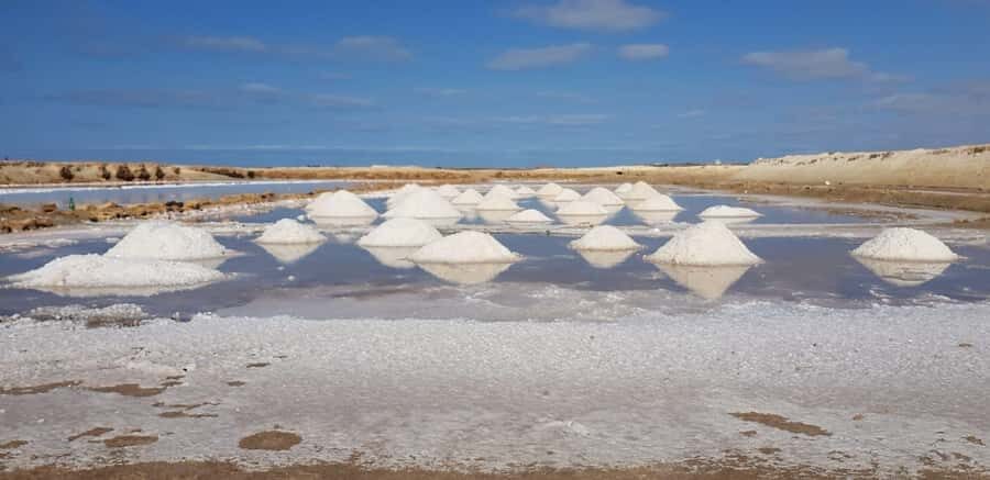 Sal island: Secrets of a Native Guide Day trip with Lunch - Pedra de Lume: Extinct Volcano Salt Lakes and the Salina Float