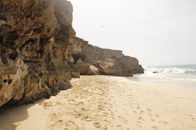 Santa Monica NO Stress Tour - Praia da Varandinha: caves, quick photos, and osprey if you’re lucky